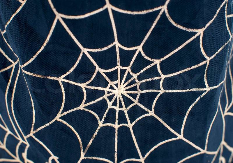 Drawing on the fabric web for Halloween, stock photo
