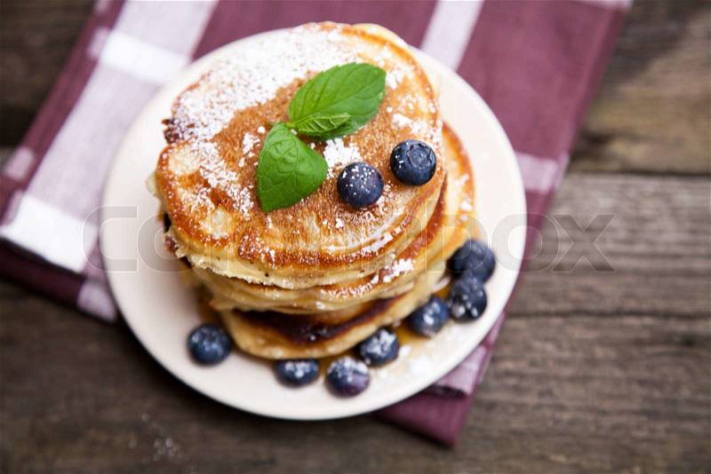 Delicious pancakes with blueberry and mint, stock photo