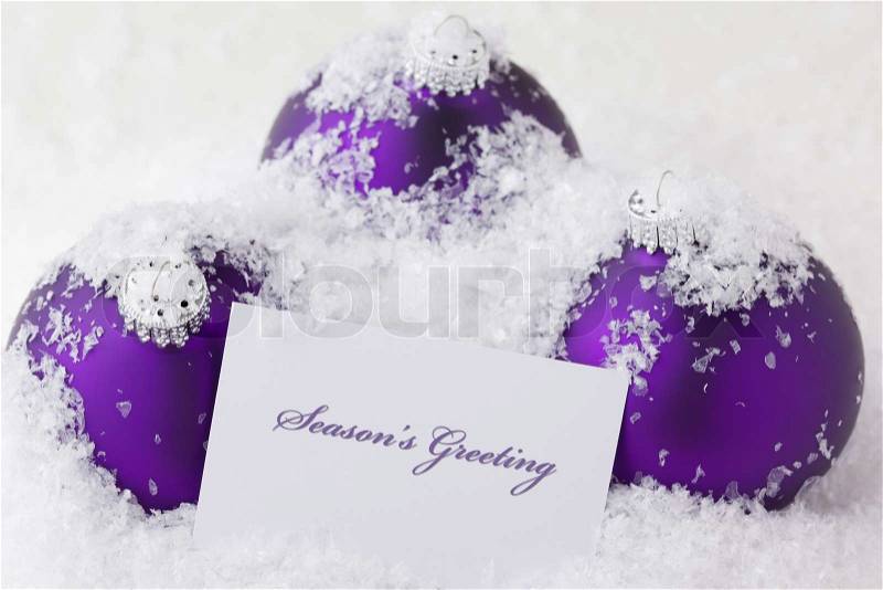 Christmas Ornaments with card and words \'season\'s greeting\', stock photo