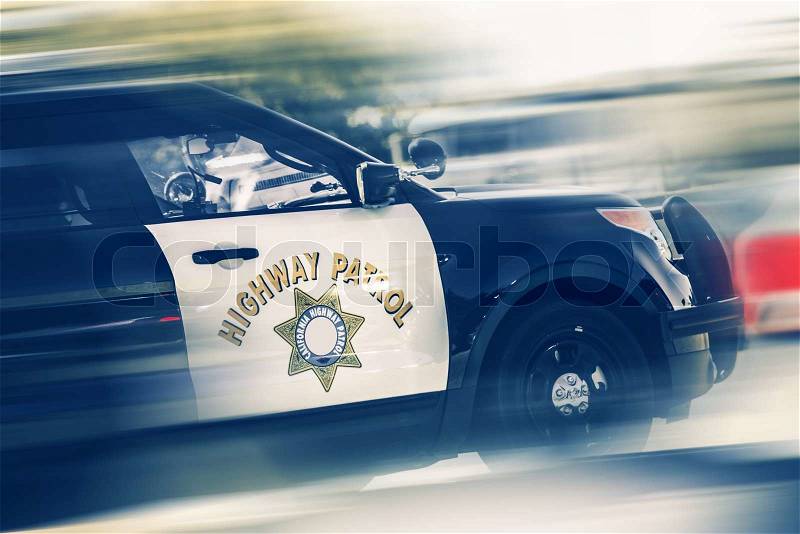 California Highway Police in Motion. SUV Police Cruiser on a Highway, stock photo