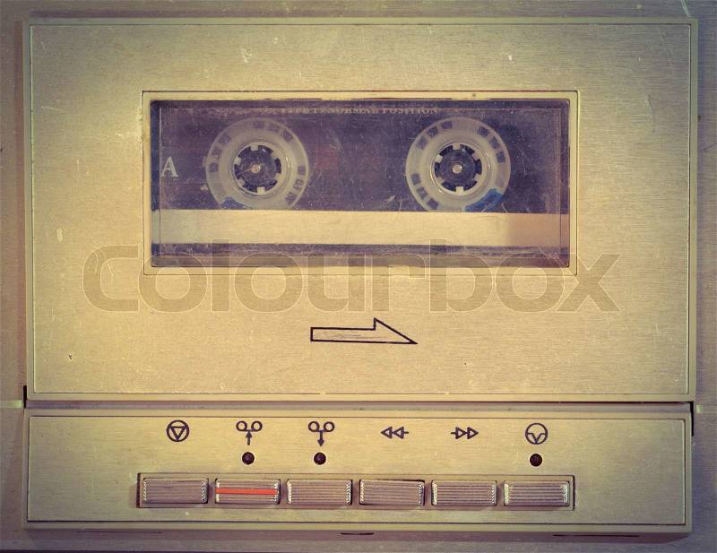 Old cassette player used as background. Retro style, stock photo