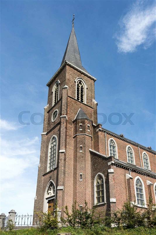 Christian church in belgium village hombourg, stock photo