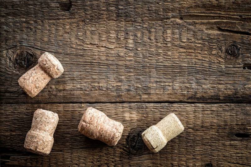 Wine bottle corks on the wooden background, stock photo