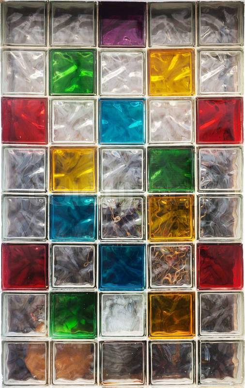 Colorful glass blocks in the window. Abstract background texture, stock photo