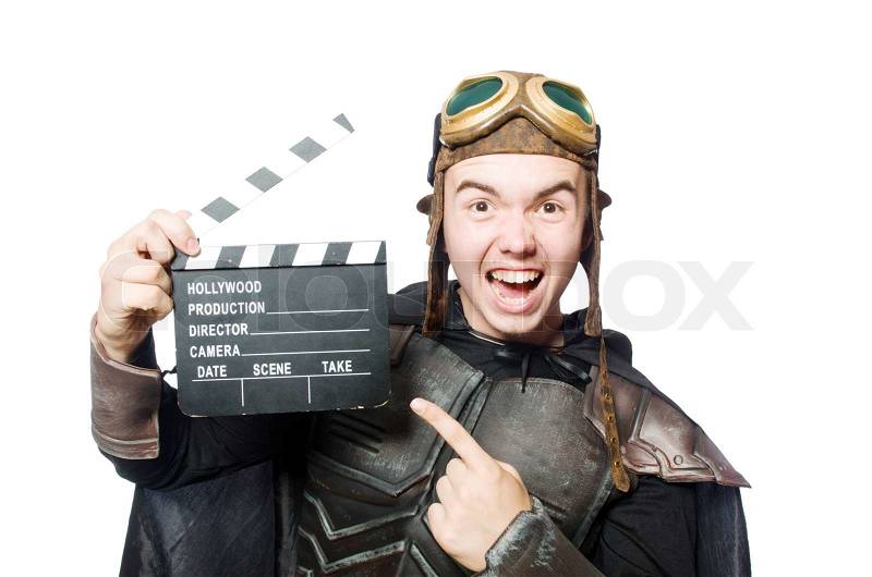 Funny pilot with movie board, stock photo