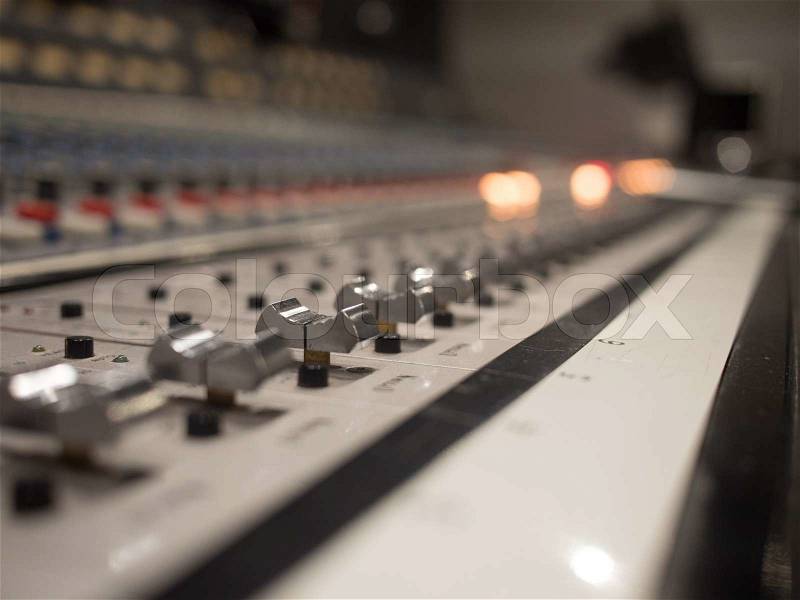 Close up Audio or Sound Mixer Sliders in a Recording Studio, stock photo
