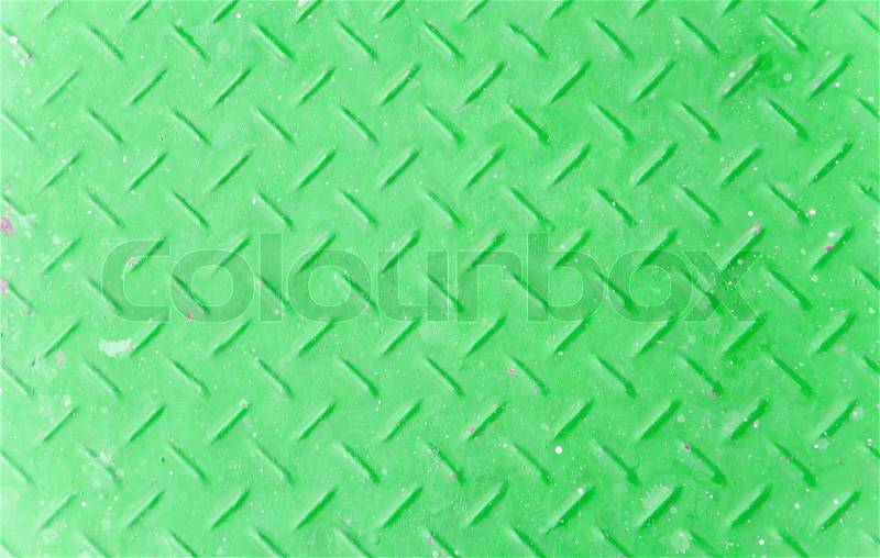 Background of old green color metal diamond plate, stock photo