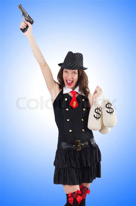 Woman gangster with gun and money, stock photo
