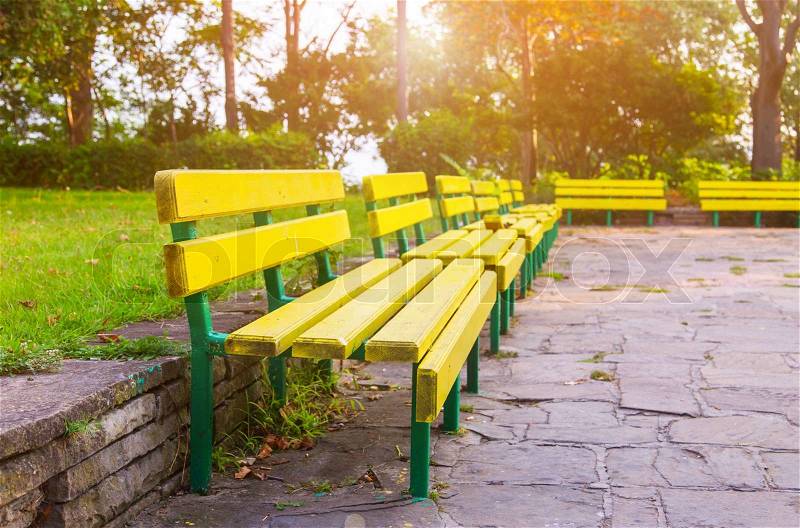 Grass park bench day background, stock photo