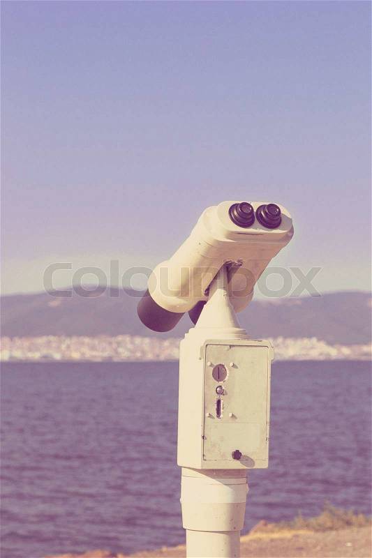 Telescope the city, the sea, the mountains, the background, stock photo