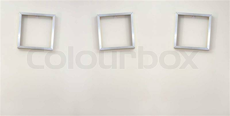 A close up shot of a hanging picture frame, stock photo