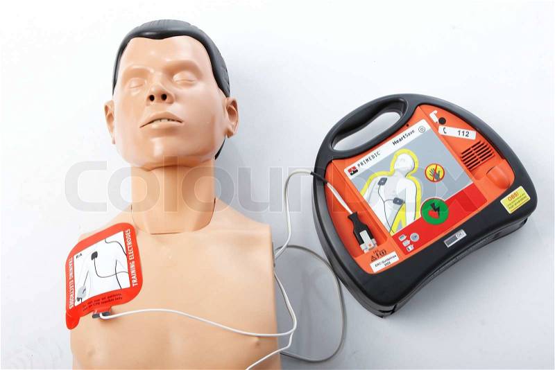 Defibrillator machine and a doll, stock photo