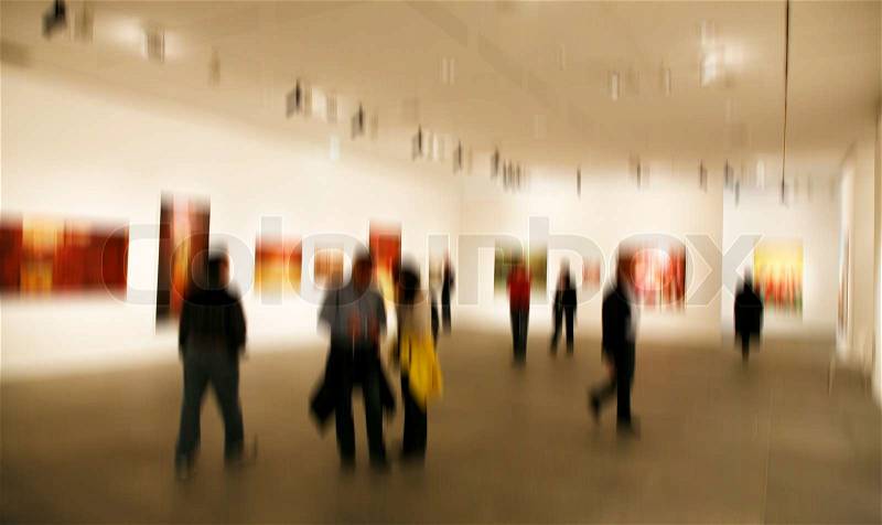 People visiting an art exhibition - Paris, France, stock photo