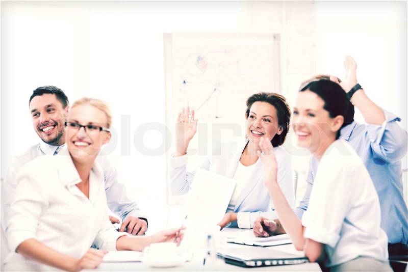Business concept - business team having meeting in office, stock photo
