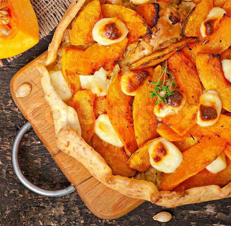 Galette with leeks, pumpkin and feta, stock photo