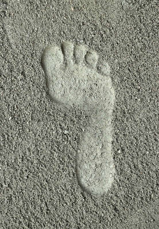 Traces of the right foot on the ground, stock photo