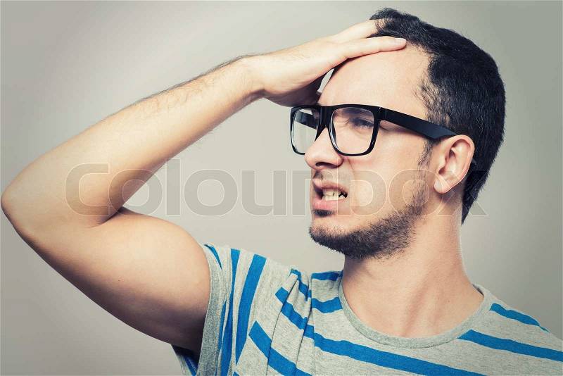 Profile of a young business man thinking, stock photo