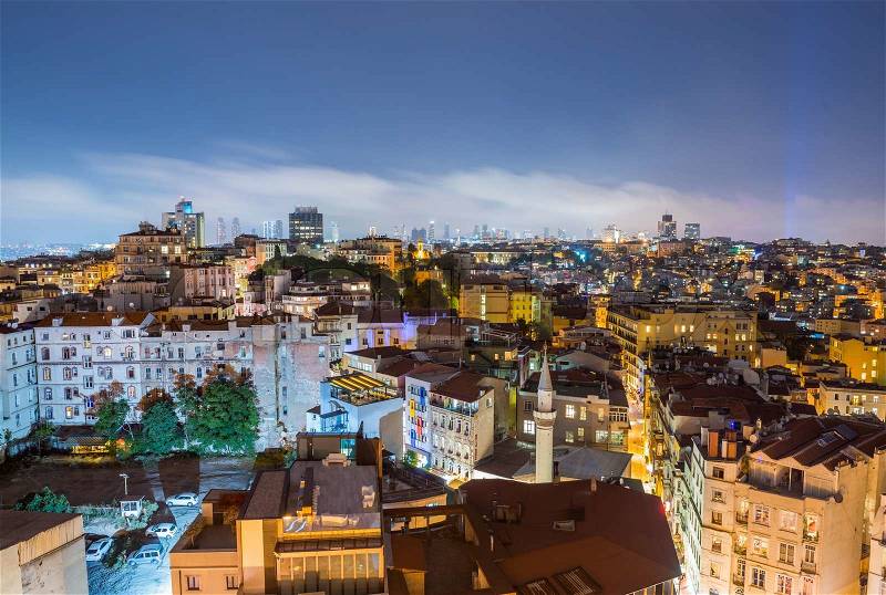 ISTANBUL - SEPTEMBER 17, 2014: City night panorama. Istanbul is visited by more than 11 million people every year, stock photo