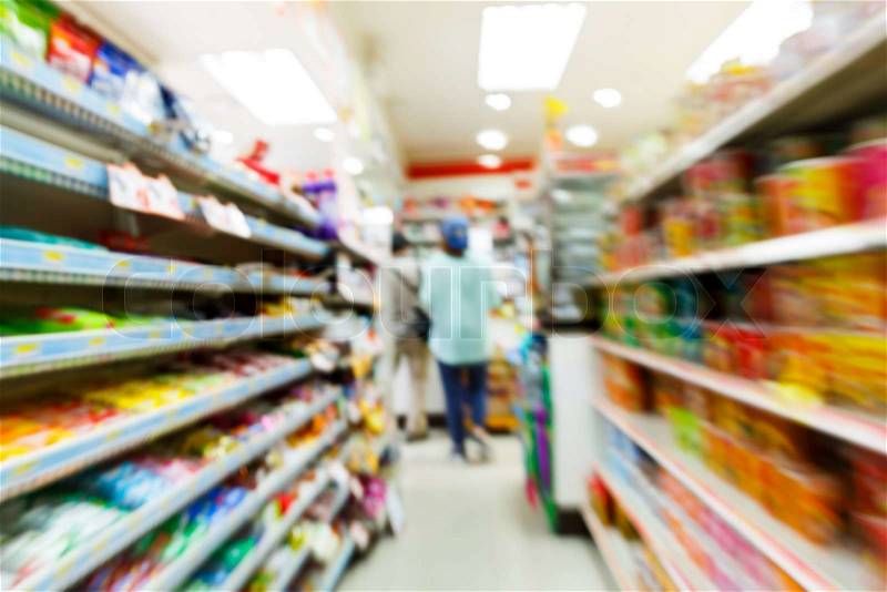 Blurry convenience store shot by moving camera with slow shutter speed, stock photo