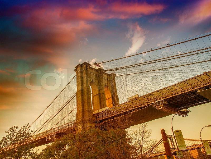 The Brooklyn Bridge at sunset as seen from Brooklyn streets - New York, stock photo