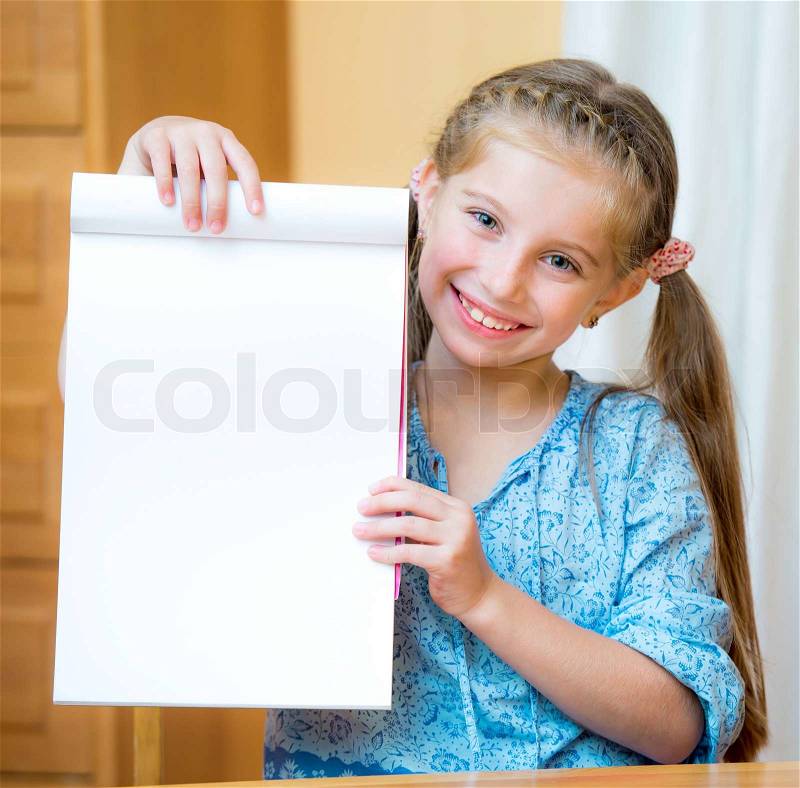 Close up portrait of a young girl holding blank sign, stock photo