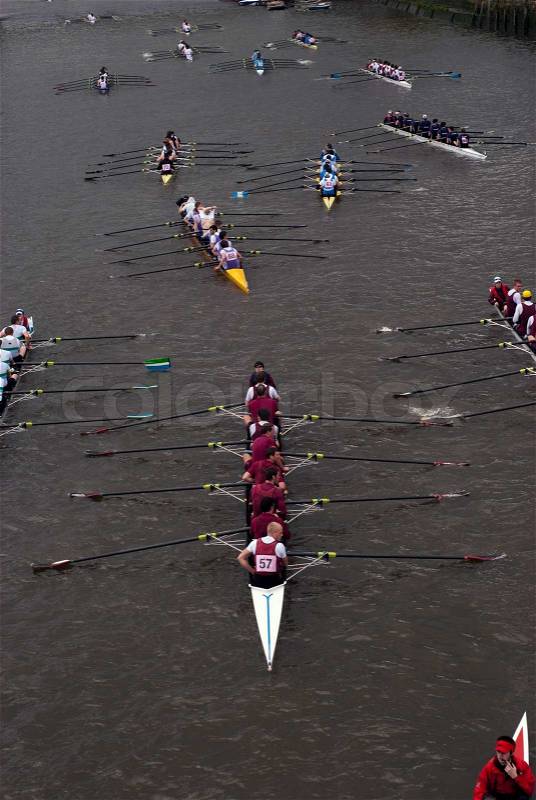 Rowers in eight-oar rowing boats on River Thames in London, England ? ?The Head of the River Race?, stock photo