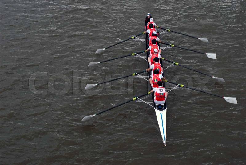 Rowers in eight-oar rowing boat on River Thames in London, England ? ?The Head of the River Race?, stock photo