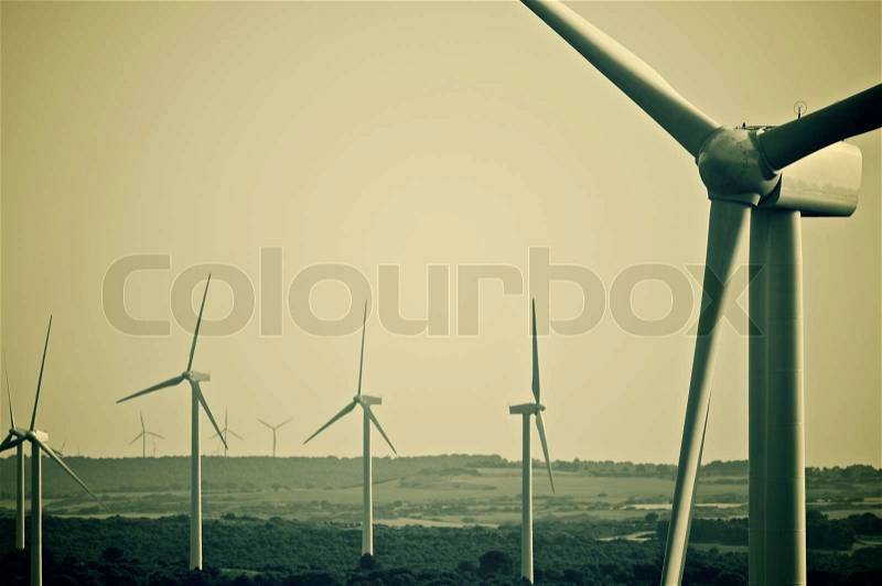 Aligned group of windmills for renewable electric energy production, Zaragoza provine, Spain, Spain, stock photo
