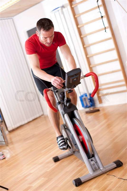 A male caucasian athlete on endurance training, stock photo