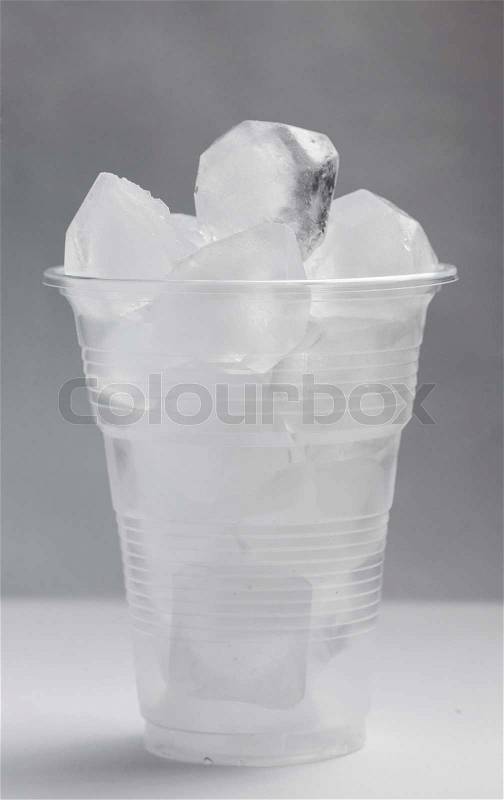 [Image: 11707233-ice-cubes-in-a-plastic-cup-with...ground.jpg]