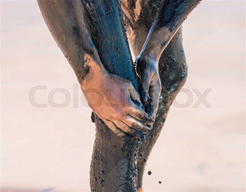 Mud treatment at the Dead Sea, stock photo