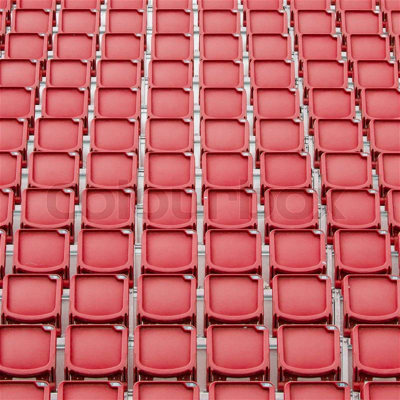 Red seat in sport stadium, empty seats ready for the public, stock photo