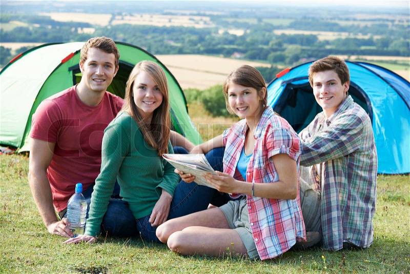 Group Of Young Friends Camping In Countryside, stock photo