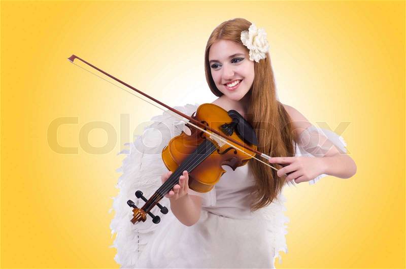 Young violin player isolated on white, stock photo