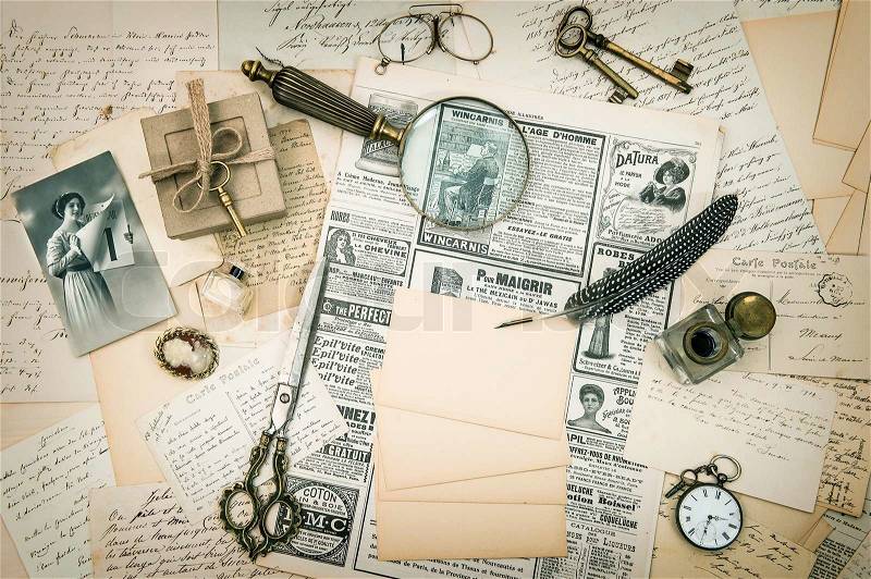 Antique accessories, vintage fashion magazine, old letters and postcards. retro style nostalgic background, stock photo