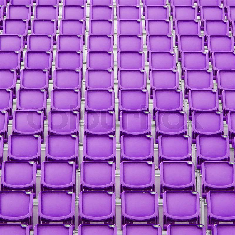 Purple seat in sport stadium, empty seats ready for the public, stock photo