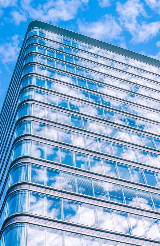 Tall office building with windows, stock photo