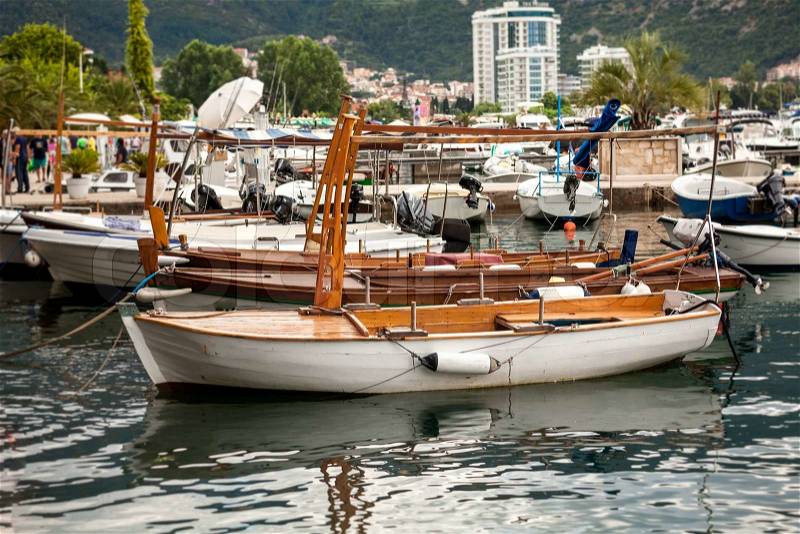 Beautiful old wooden boat used for touristic trips moored at sea harbor, stock photo