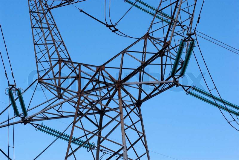 Part of pylon with electrical appliances and wire, from below, stock photo