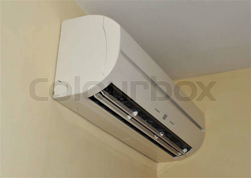 Air conditioner on a wall in the interior, stock photo