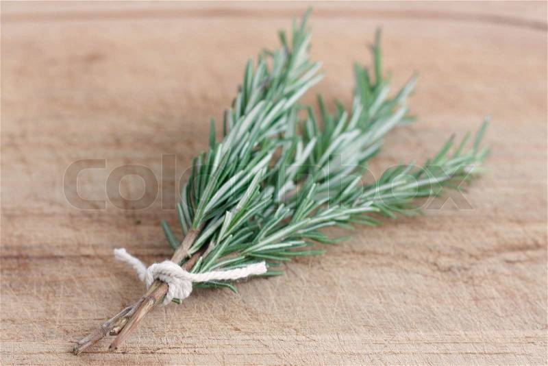 Fragrant rosemary herbs isolated on white, stock photo