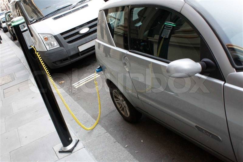 An electronic car chargingin the city, stock photo