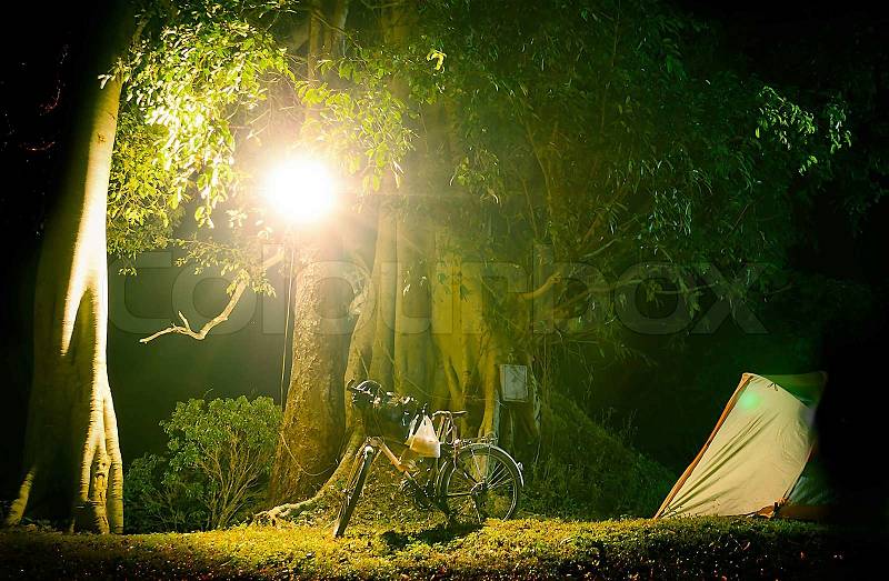 The Bicycle Touring Camping at Night Time, stock photo