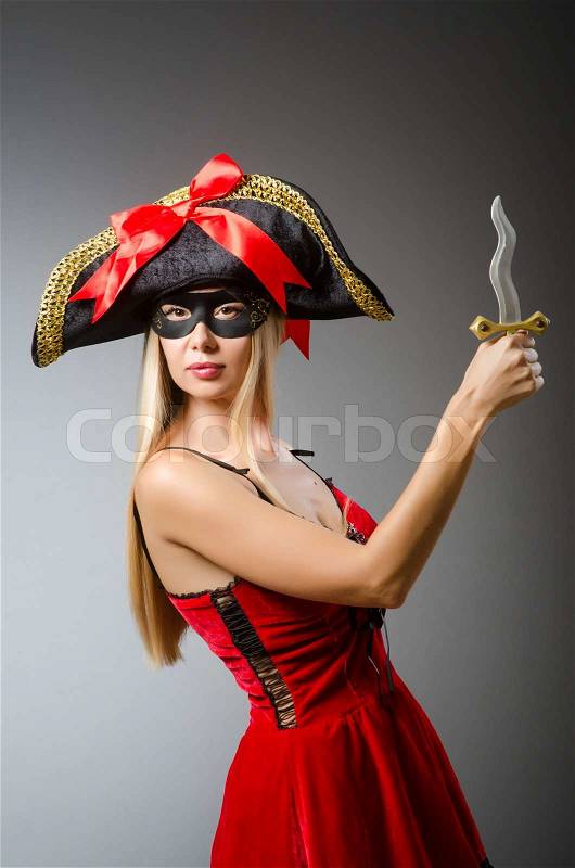 Woman pirate with sharp knife, stock photo