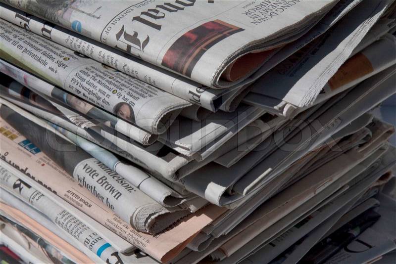 Pile of various newspapers, stock photo