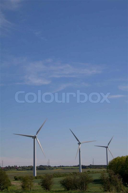 Blue sky with wind turbines, stock photo