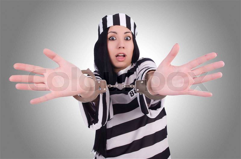 Prisoner in striped uniform on white, stock photo