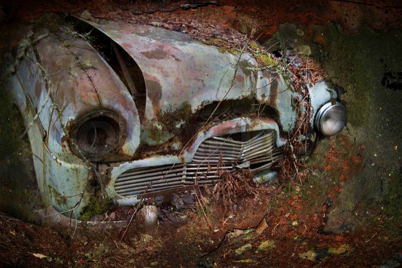 Once upon a time there was an automobile. More of my photos worked together to underline time and decay. From the series scrap in the wood, stock photo