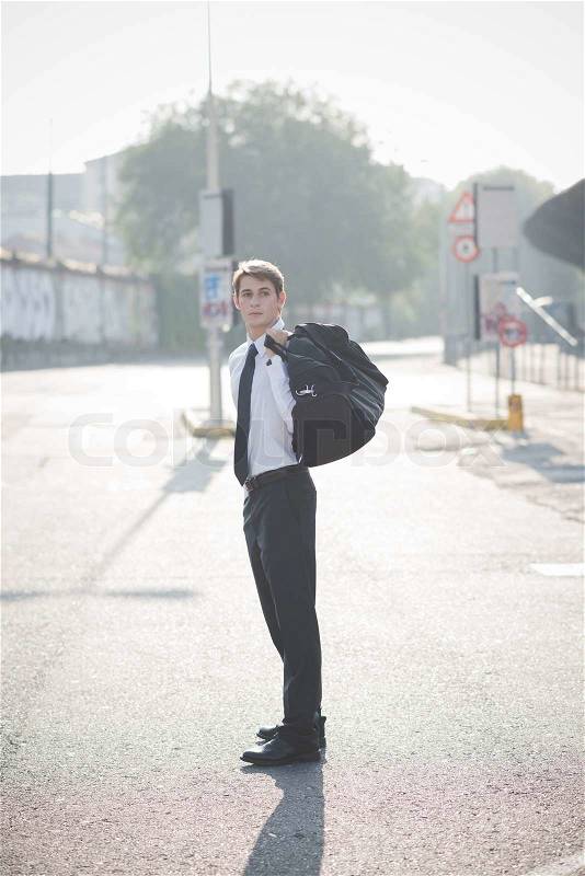 Young handsome elegant blonde model man in the city, stock photo