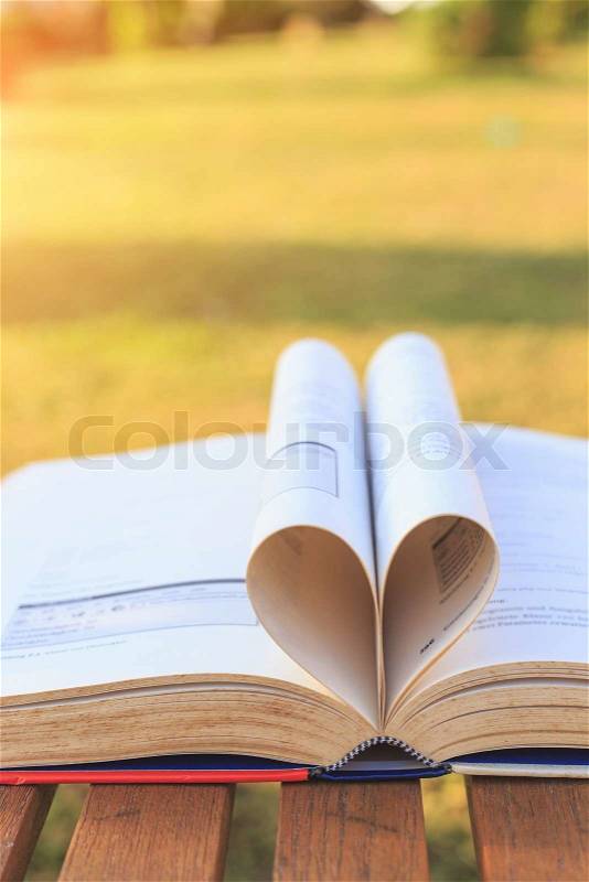 Close up book on table in morning time, stock photo